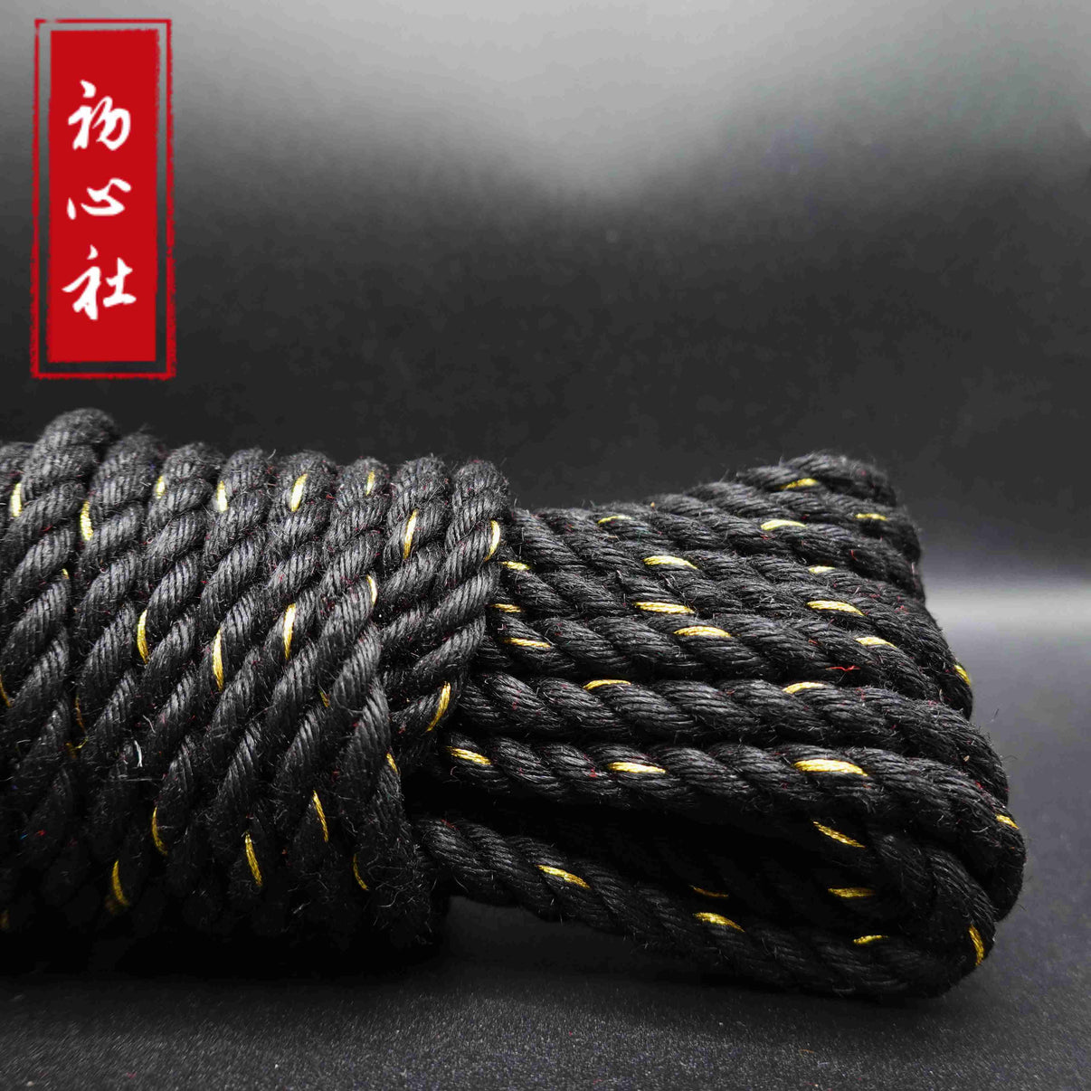 Multi colored jute rope kit, intricately designed with black and yellow strands for enhanced visual appeal.