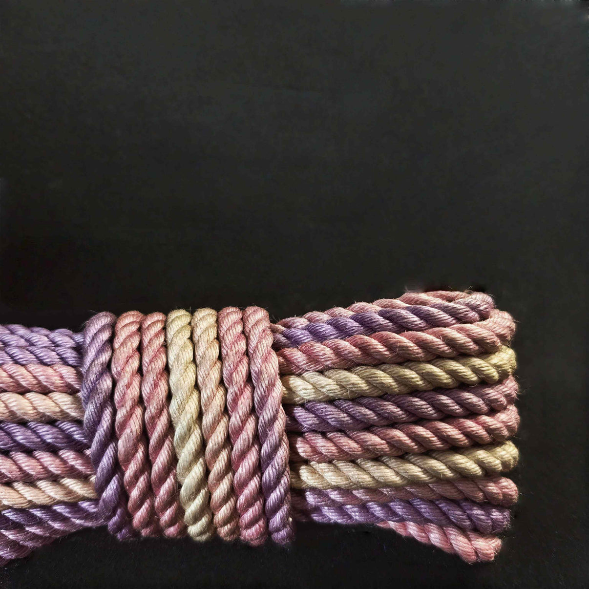 Princess Jute Rope in purple and pink colors, perfect for shibari rope applications.